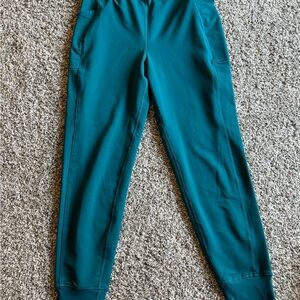 Fabletics Teal Slim Cut Joggers with Elastic Cuffs and Tapered Legs and POCKETS!